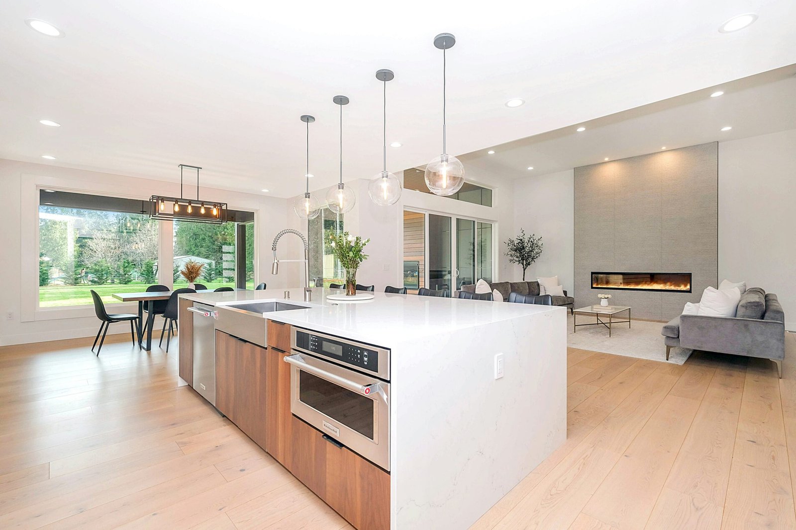 Professional cleaner actively cleaning a modern kitchen